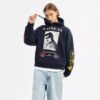 Bluza z kapturem o luźnym kroju z motywem kolażu dinozaurów, wykonana z bawełny organicznej