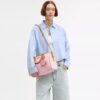 Duża torba typu satchel Rowan z Signature Canvas z zawieszkami