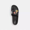Klapki Disney X Coach z nadrukiem naklejek