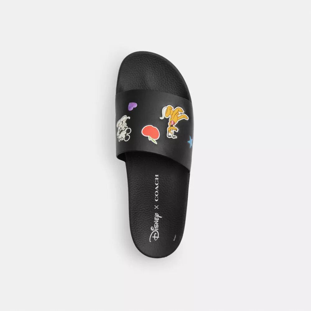 Klapki Disney X Coach z nadrukiem naklejek