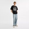Luźny T-shirt „Dinosaur City” z bawełny organicznej