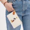 Mała saszetka na nadgarstek Disney X Coach z regenerowanej skóry z Myszką Miki