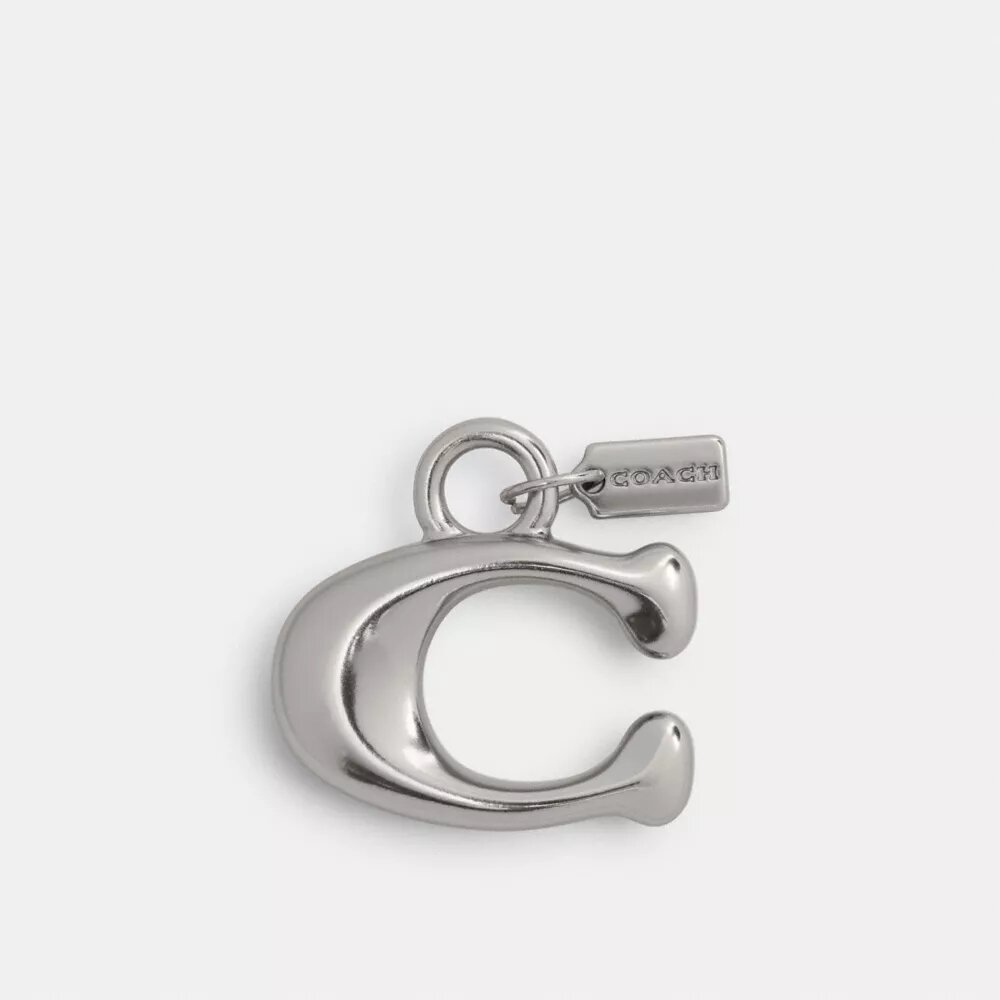 Mała zawieszka z logo Coach w kształcie buta