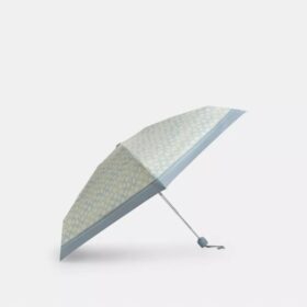 Mini parasolka z ochroną przed promieniowaniem UV w ładnym, charakterystycznym wzorze
