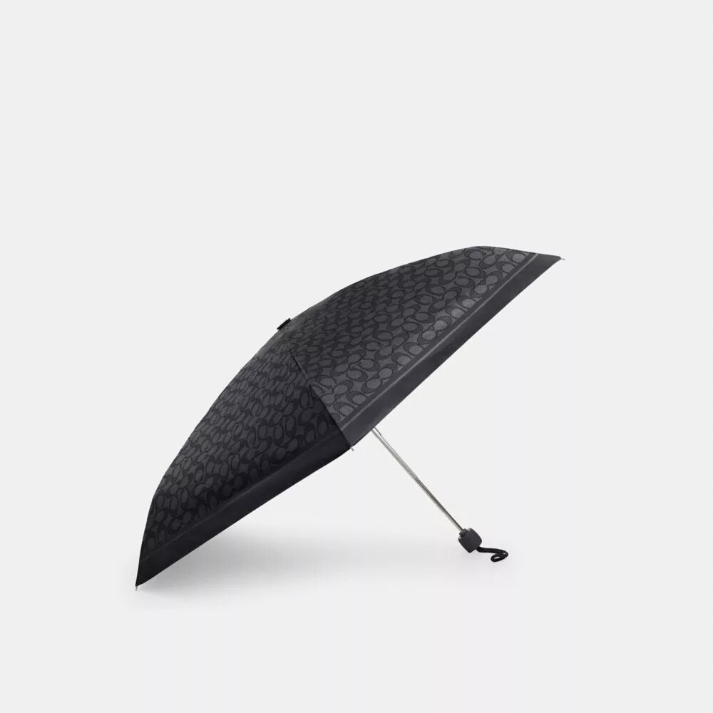 Mini parasolka z ochroną przed promieniowaniem UV w charakterystycznym nadruku