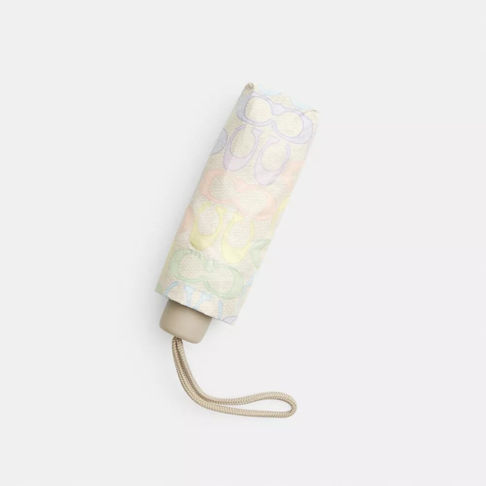 Mini parasolka z ochroną przed promieniowaniem UV w charakterystycznym wzorze Rainbow