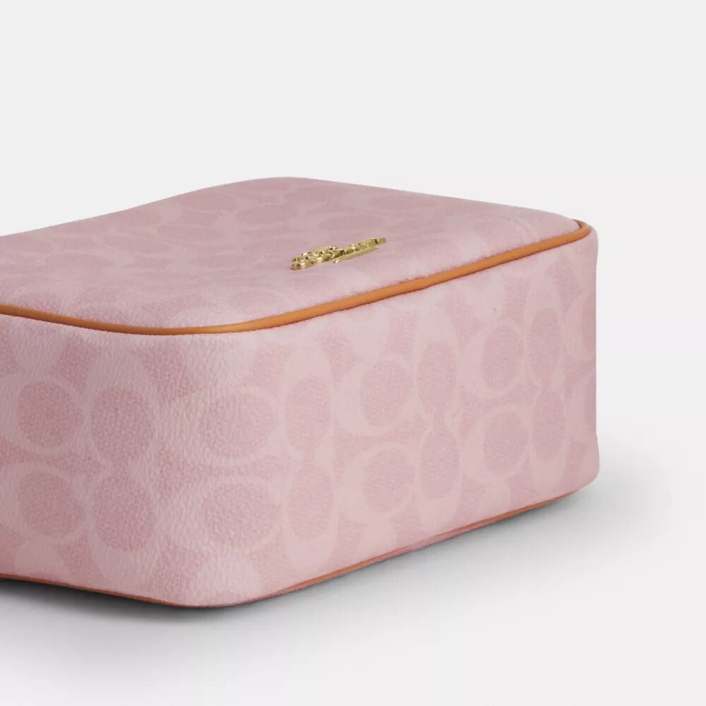 Mini torebka Carey do noszenia na ramię z Signature Canvas z zawieszkami