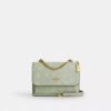 Mini torebka crossbody Klare z kwiatowym nadrukiem