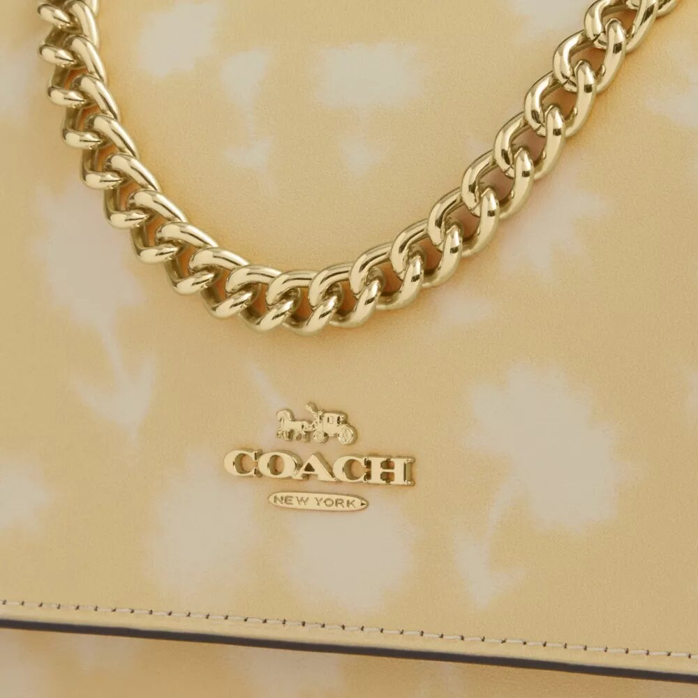 Mini torebka crossbody Klare z kwiatowym nadrukiem