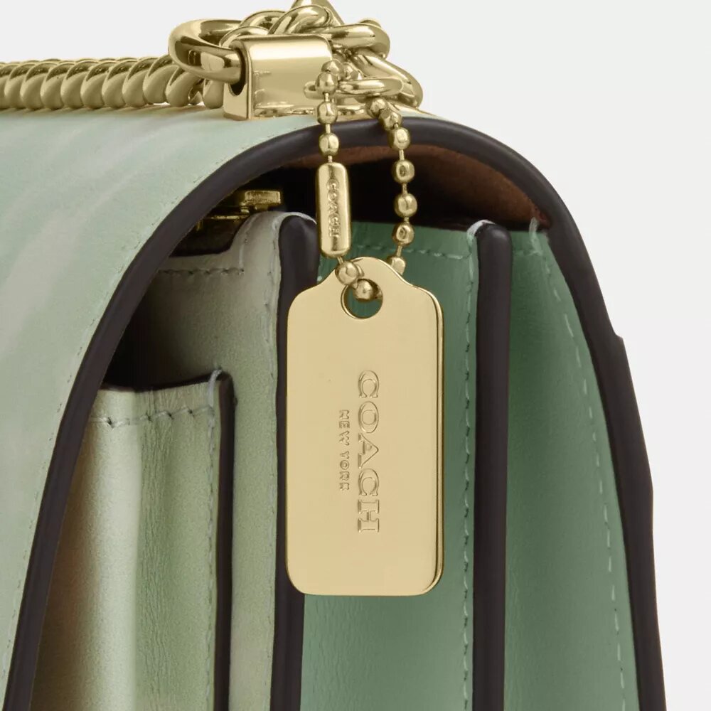 Mini torebka crossbody Klare z kwiatowym nadrukiem