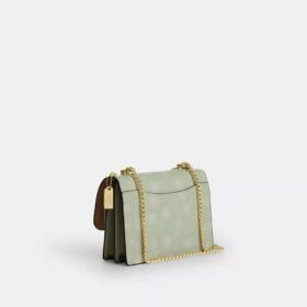 Mini torebka crossbody Klare z kwiatowym nadrukiem