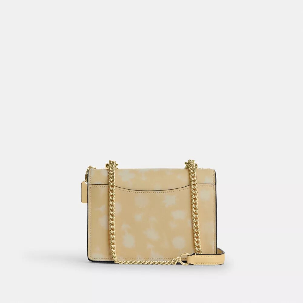 Mini torebka crossbody Klare z kwiatowym nadrukiem