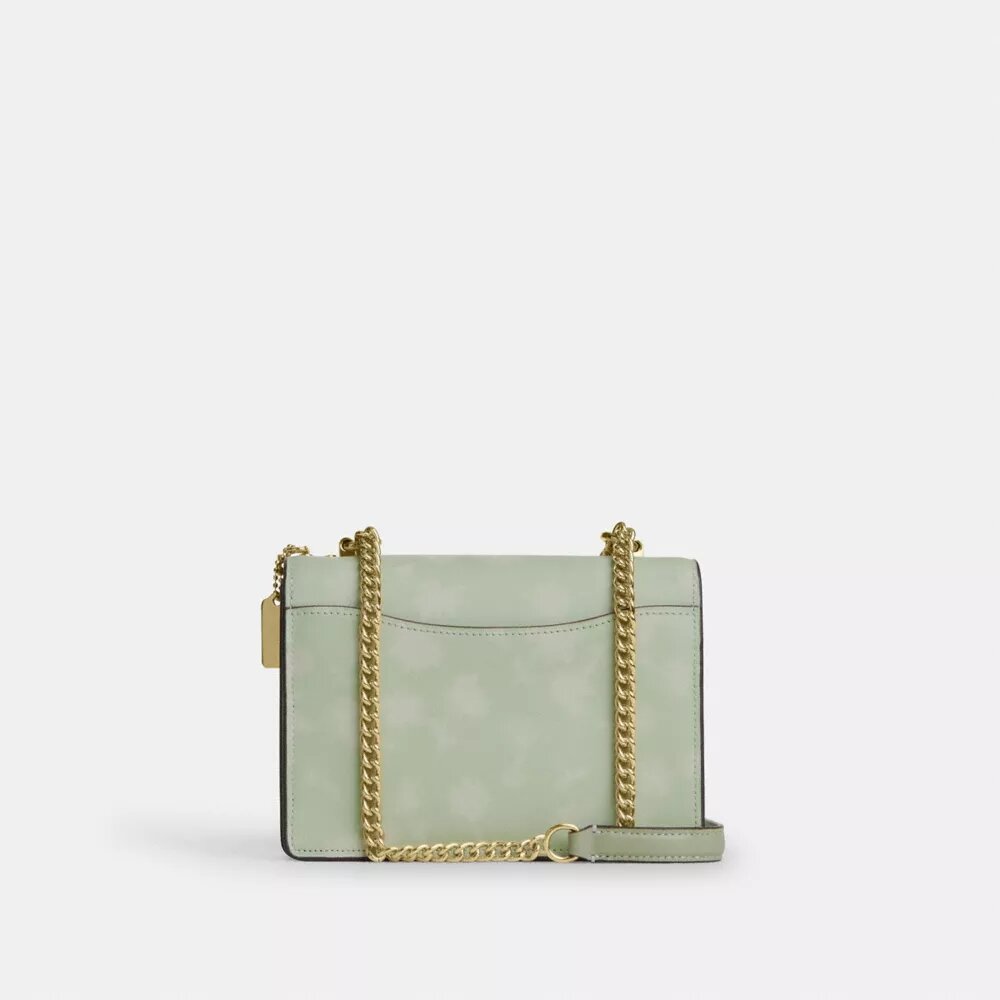 Mini torebka crossbody Klare z kwiatowym nadrukiem