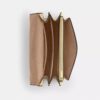 Mini torebka crossbody Klare z kwiatowym nadrukiem