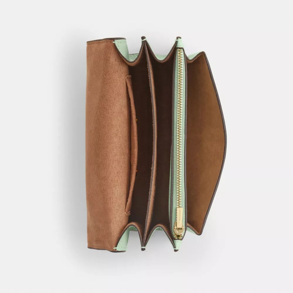 Mini torebka crossbody Klare z kwiatowym nadrukiem