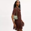 Mini torebka crossbody Klare z kwiatowym nadrukiem