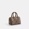 Mini torebka crossbody Rowan z charakterystycznego żakardu z kwiatowym haftem