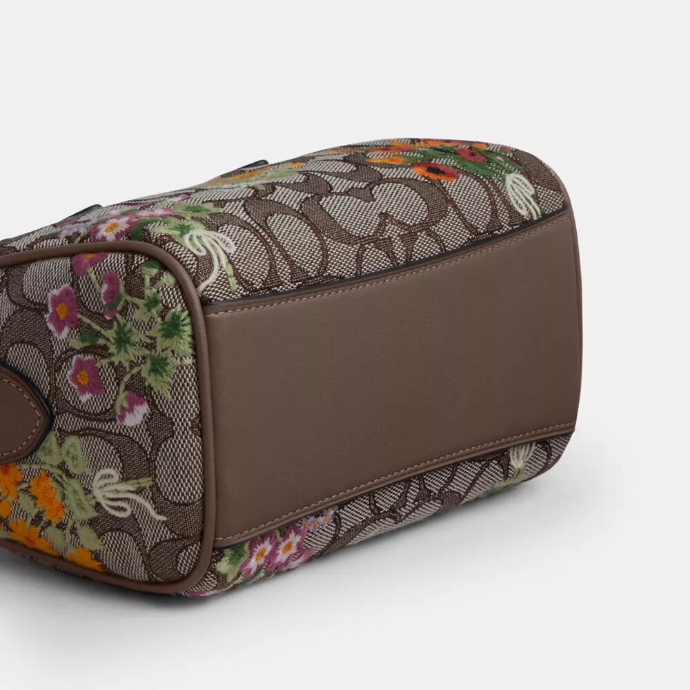 Mini torebka crossbody Rowan z charakterystycznego żakardu z kwiatowym haftem
