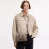 Mini torebka crossbody Rowan z charakterystycznego żakardu z kwiatowym haftem