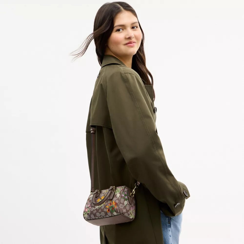 Mini torebka crossbody Rowan z charakterystycznego żakardu z kwiatowym haftem