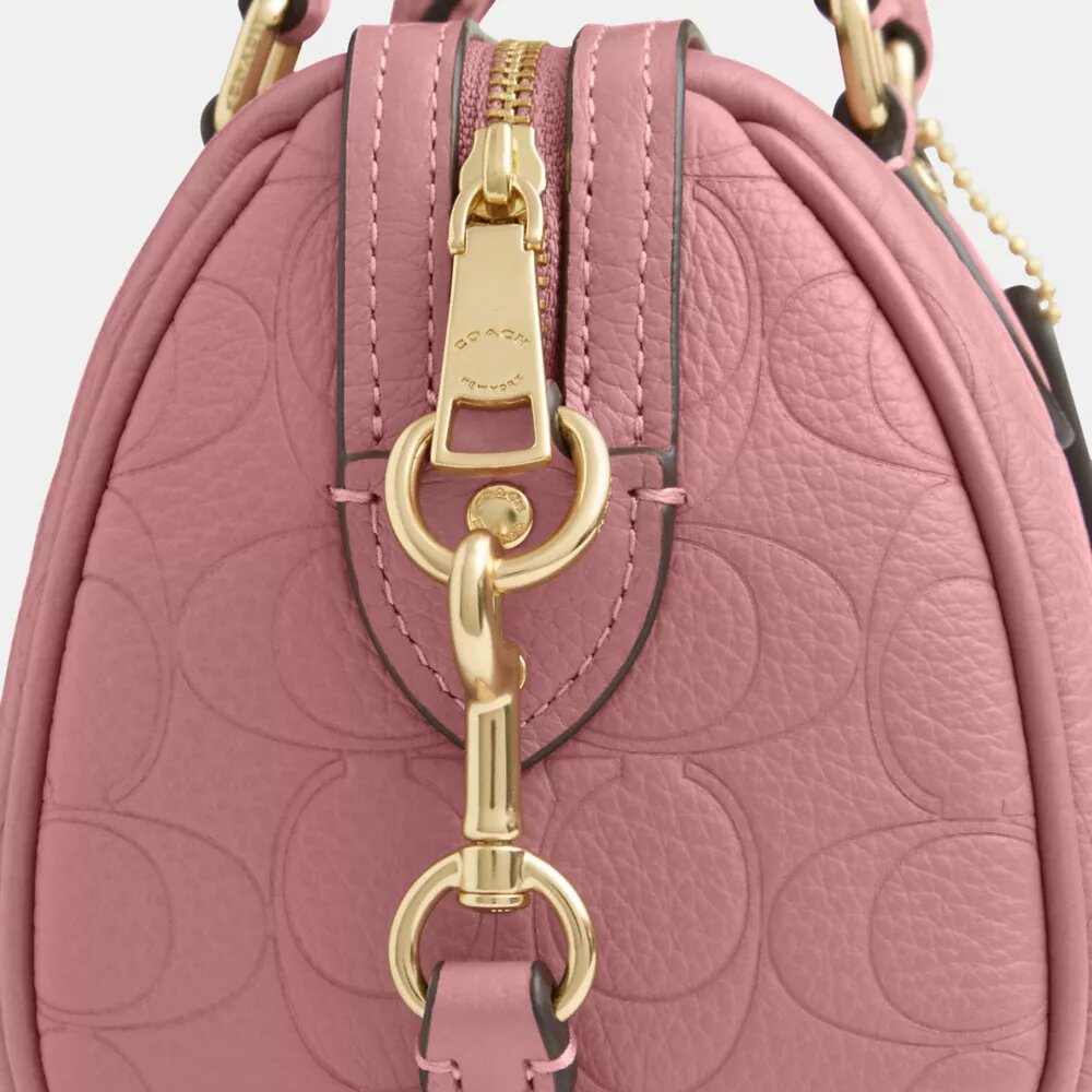 Mini torebka crossbody Rowan z charakterystycznej skóry