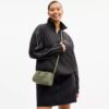 Mini torebka crossbody Rowan z charakterystycznej skóry