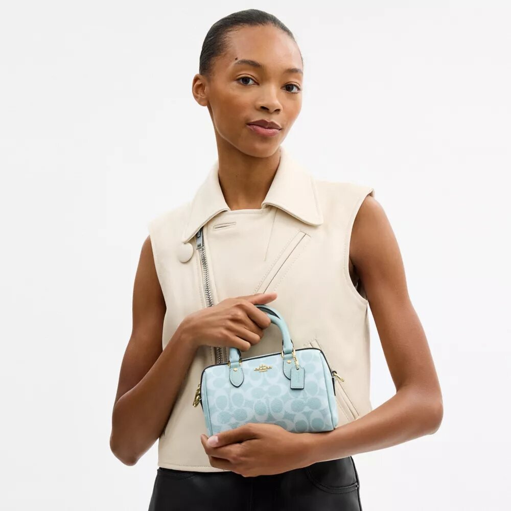 Mini torebka crossbody Rowan z Signature Canvas