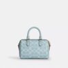 Mini torebka crossbody Rowan z Signature Canvas
