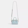 Mini torebka crossbody Rowan z Signature Canvas