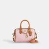 Mini torebka crossbody Rowan z Signature Canvas z zawieszkami