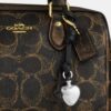 Mini torebka crossbody Rowan z Signature Canvas z Zawieszkami