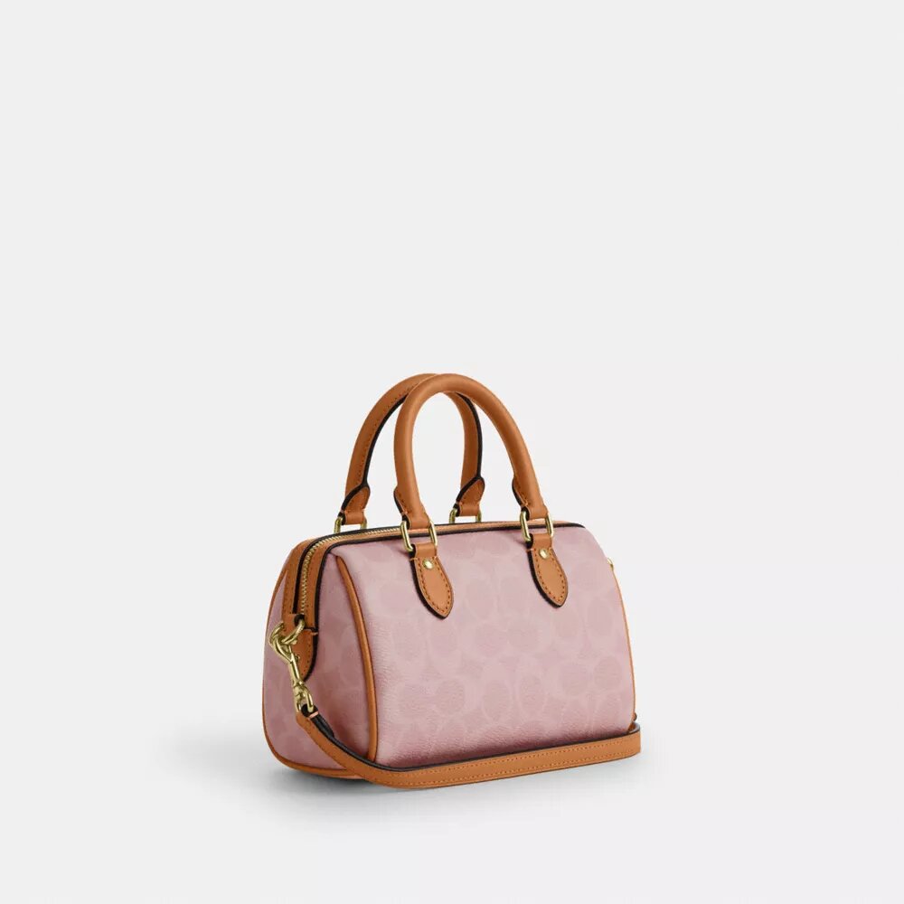 Mini torebka crossbody Rowan z Signature Canvas z zawieszkami