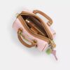 Mini torebka crossbody Rowan z Signature Canvas z zawieszkami