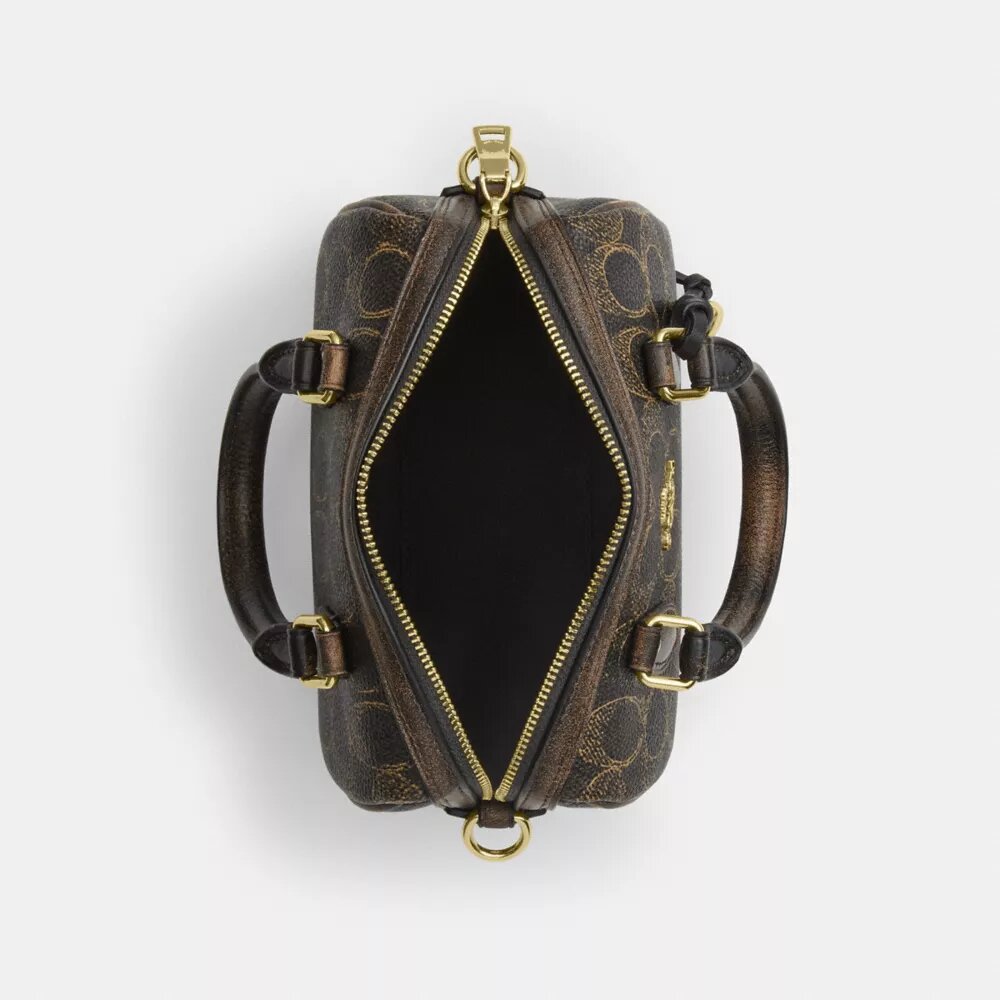 Mini torebka crossbody Rowan z Signature Canvas z Zawieszkami