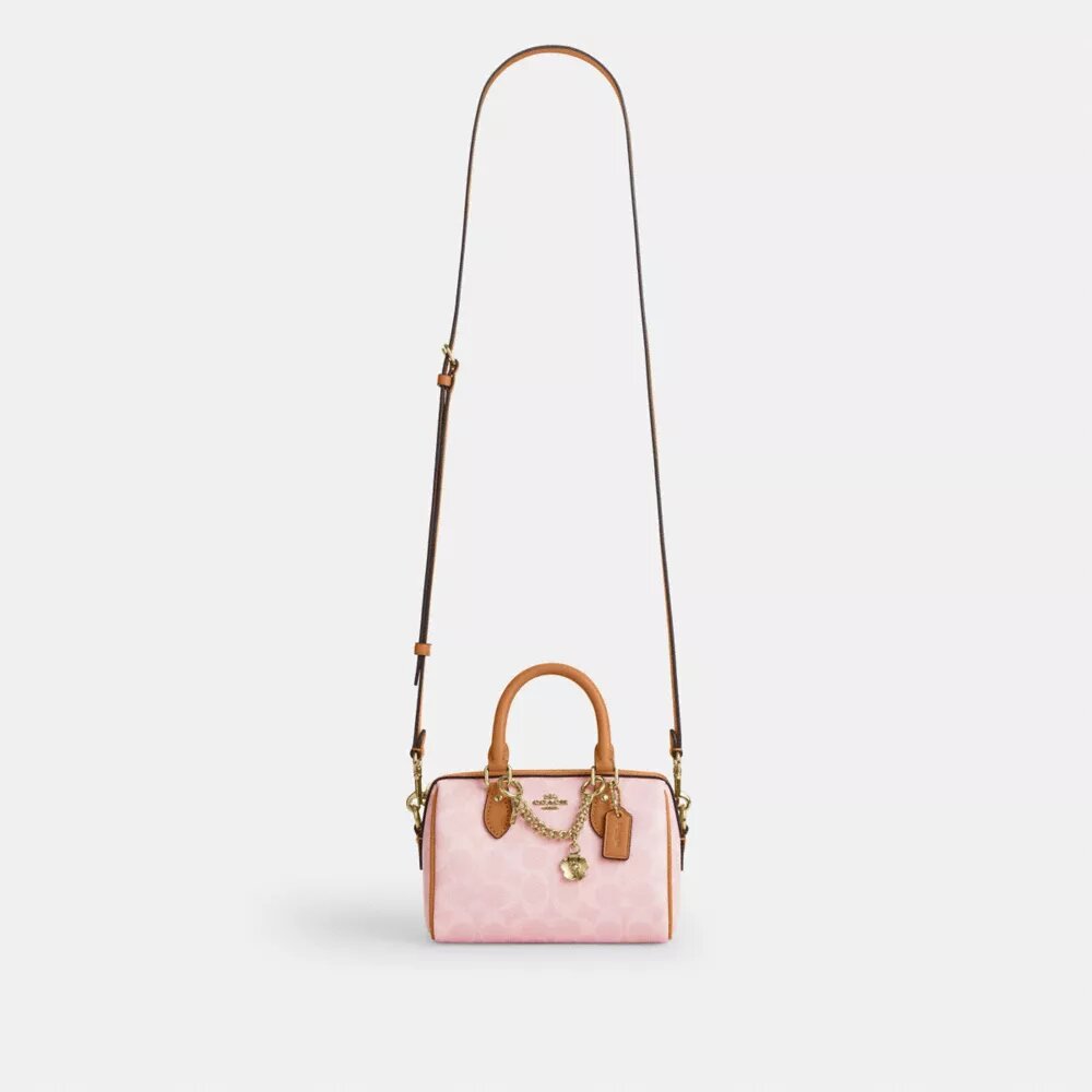 Mini torebka crossbody Rowan z Signature Canvas z zawieszkami