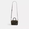 Mini torebka crossbody Rowan z Signature Canvas z Zawieszkami