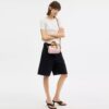 Mini torebka crossbody Rowan z Signature Canvas z zawieszkami