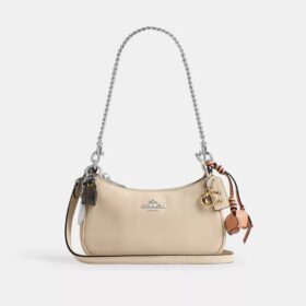 Mini torebka crossbody Teri z zawieszkami