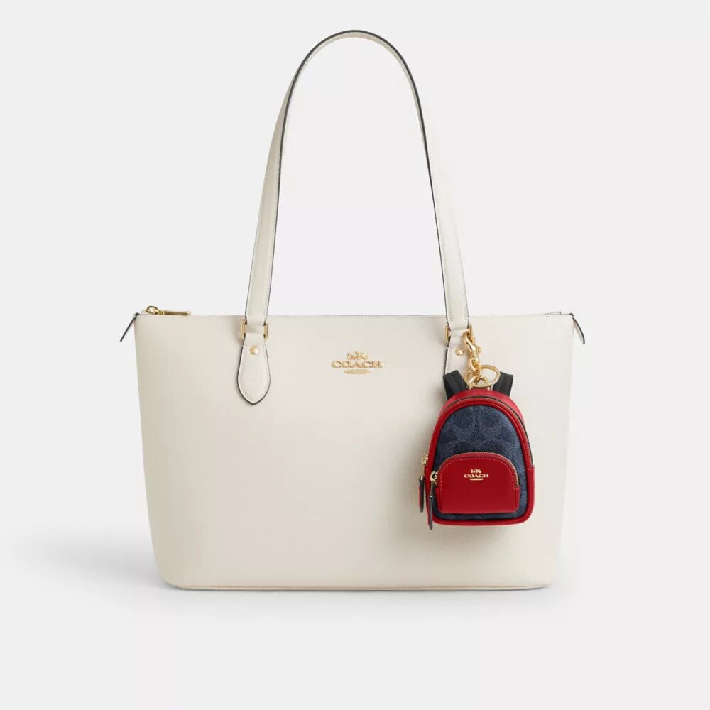 Mini zawieszka do Court Backpack z Signature Canvas