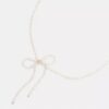 Naszyjnik typu choker z perłową kokardką