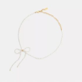 Naszyjnik typu choker z perłową kokardką