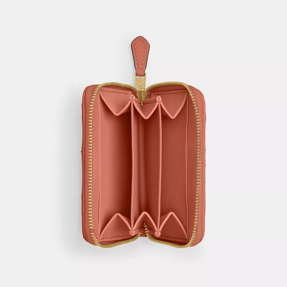 Niezbędne, małe etui na karty z zamkiem dookoła i pikowaniem typu „pillow”