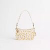Odnowiona torba Swinger Bag 20 z kwiatowym nadrukiem