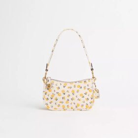 Odnowiona torba Swinger Bag 20 z kwiatowym nadrukiem