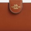 Średni portfel z zamkiem w rogu