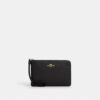 Saszetka na nadgarstek z zamkiem w rogu