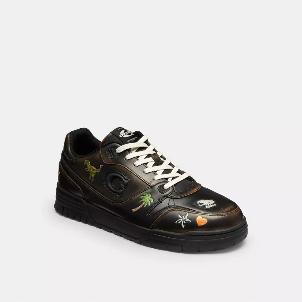 Sneakersy Soho z nadrukiem naklejek z okazji 10. urodzin Rexy’ego