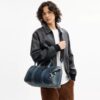 Torba Compass 35 z regenerowanego denimu bawełnianego z zawieszkami