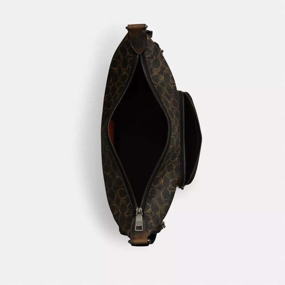 Torba crossbody Finn z kieszeniami z Signature Canvas