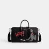Torba Disney X Coach Compass 35 z Pluto